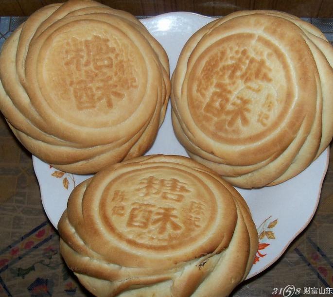 >  地方小吃 糖酥杠子头火食 山东喻户晓的面食  糖酥杠子头是烟台最